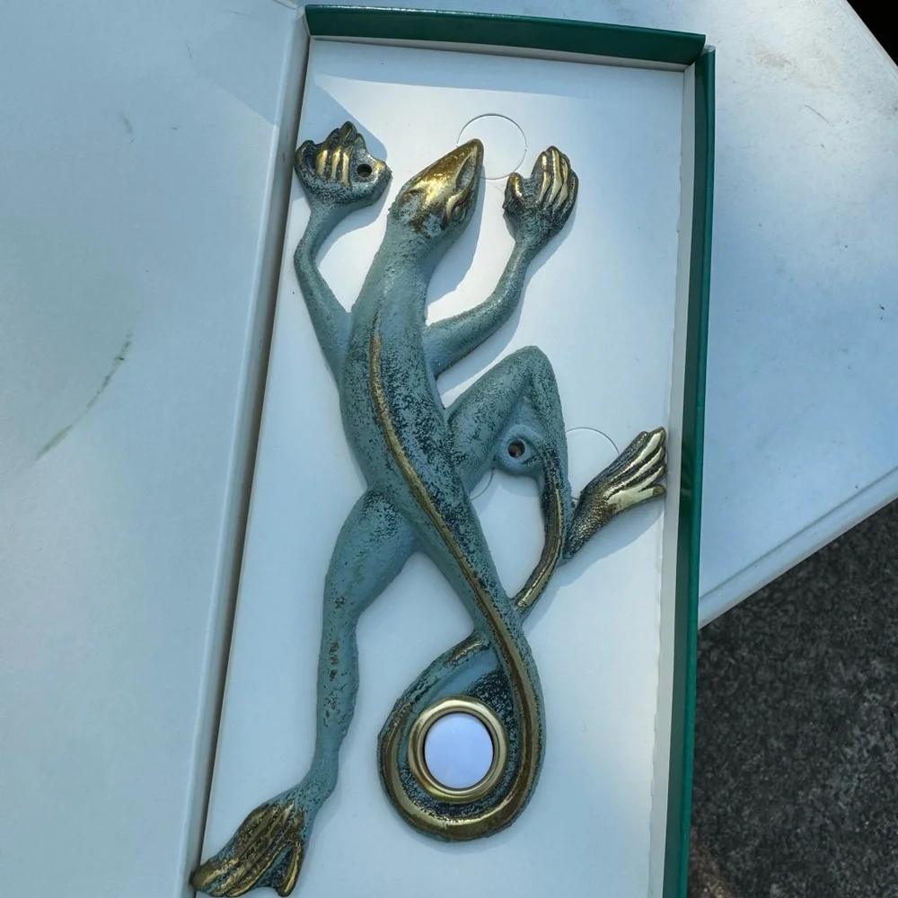 Vintage flora and fauna doorbell solid brass.